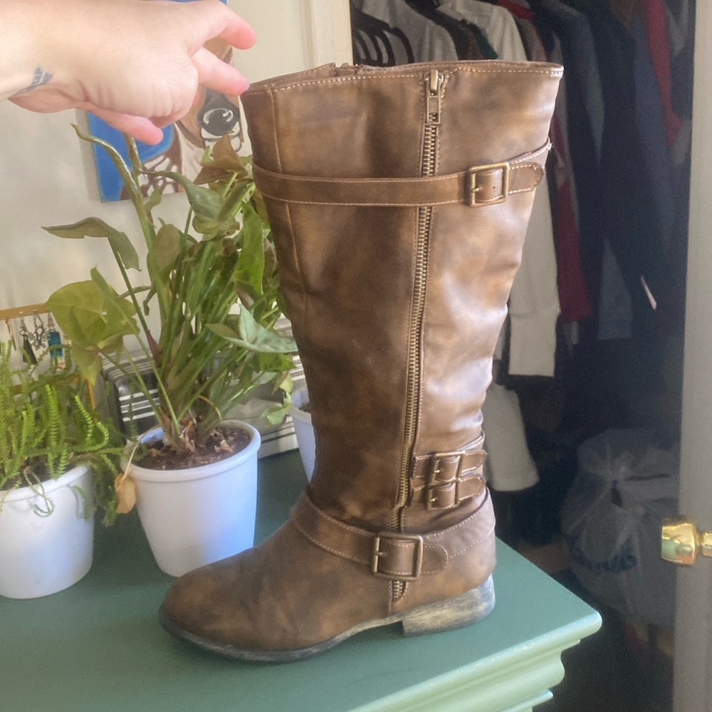 Size 7 brown faux leather boots; good condition.